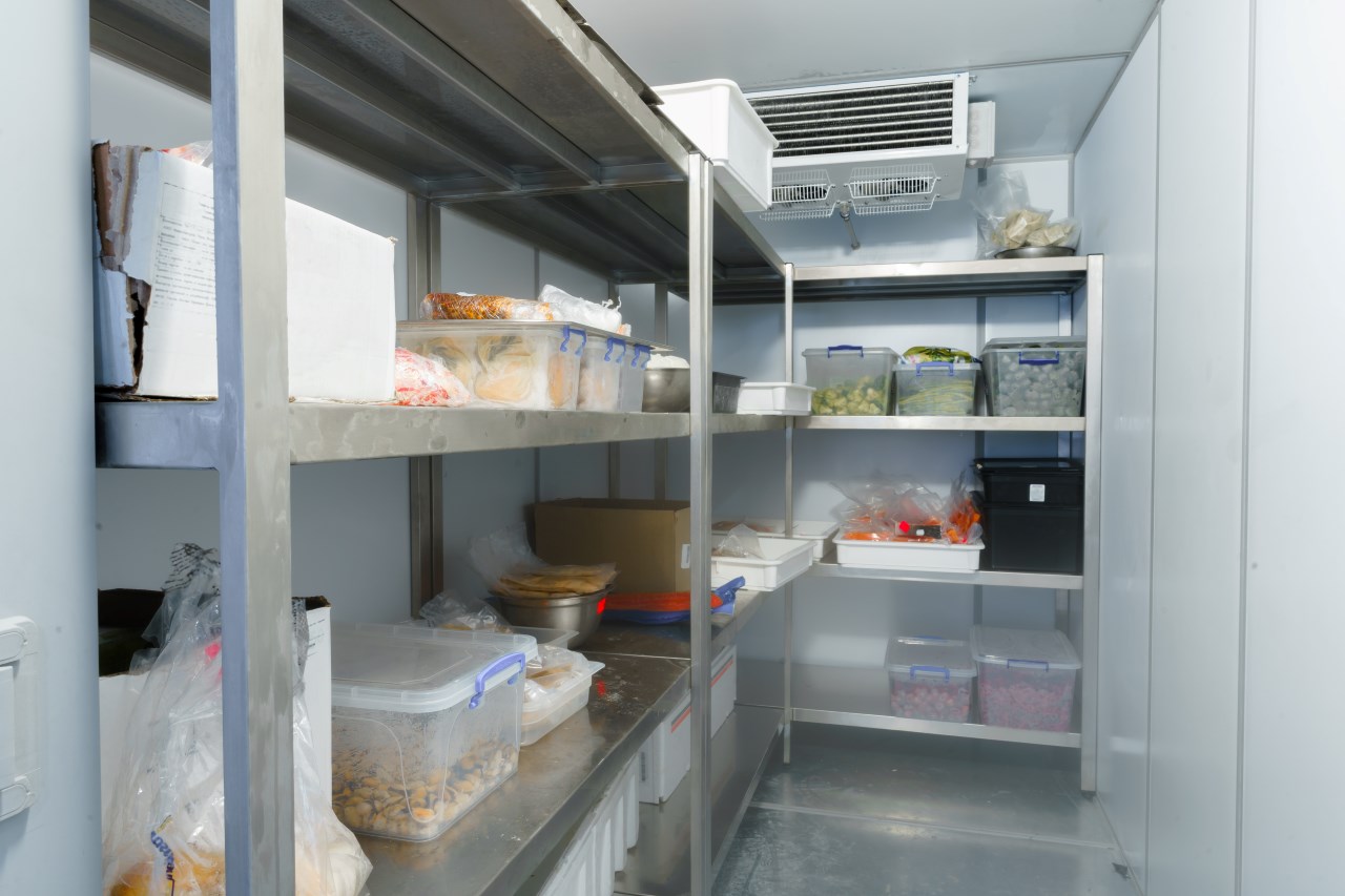 cold storage with steel shelves in a restaurant