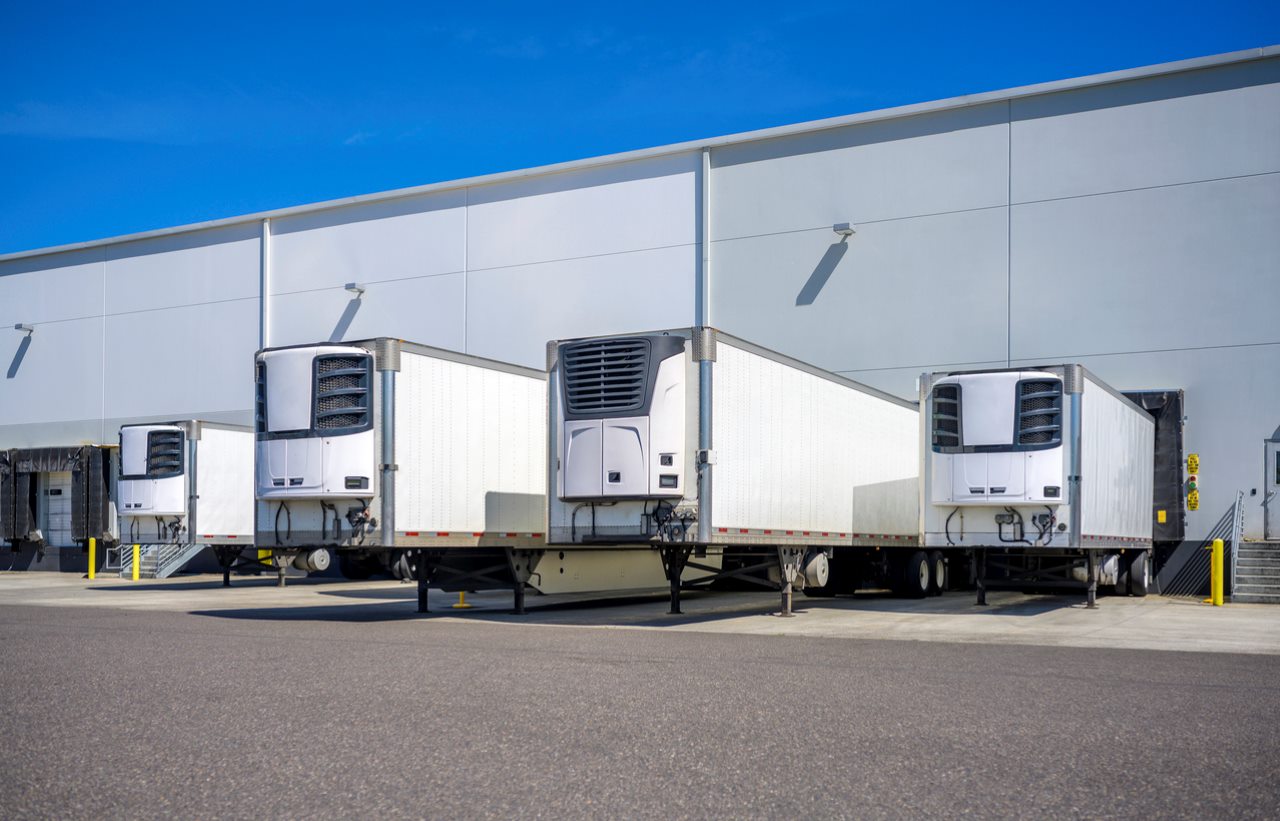 Industrial grade refrigerator semi trailers with reefer units on the front wall